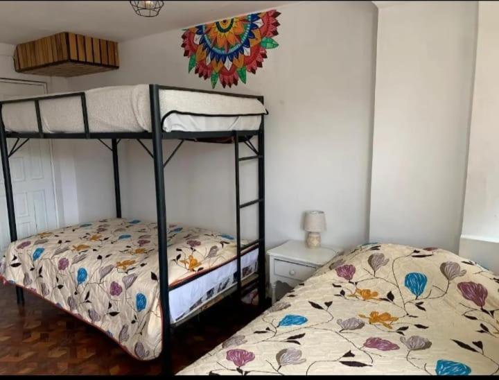 Puruha Inn - Deluxe Quadruple Room - 1