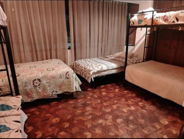 Puruha Inn - Deluxe Quadruple Room - 2