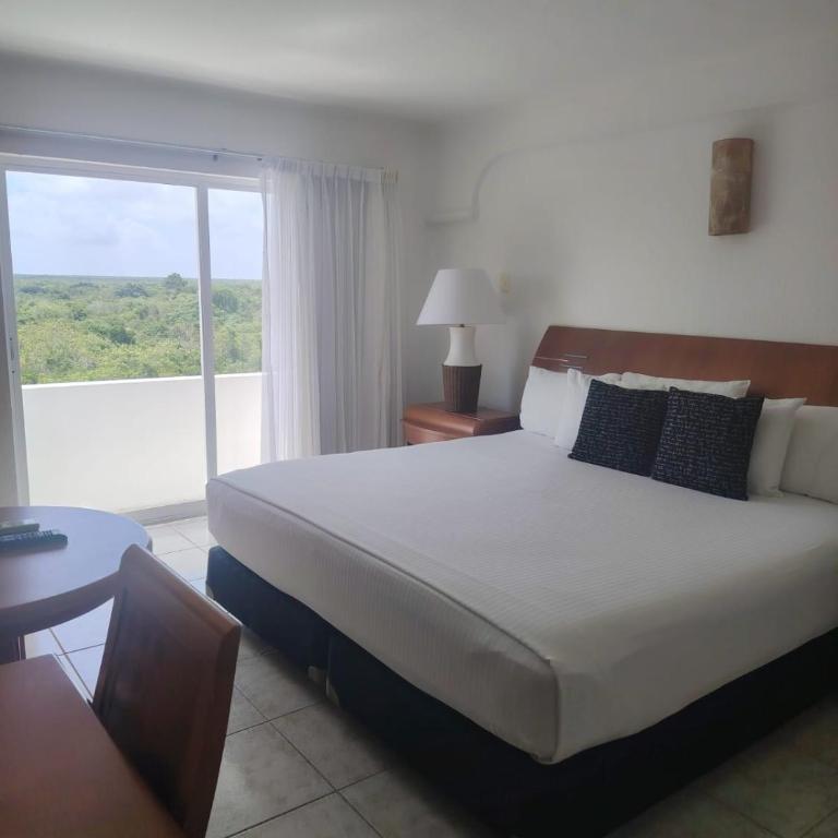 Coral Princess Hotel & Dive Resort - Superior Zimmer Dschungel-Abenteuer mit Kingsize-Bett - 13