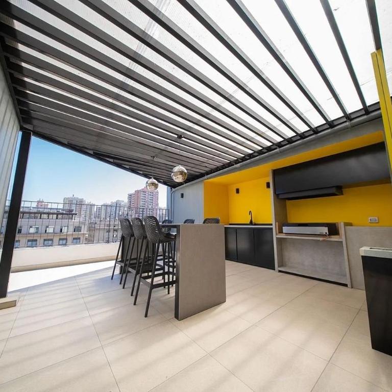 Condor Suites Executive Santiago Centro offers a terrace, barbecue, and Wi-Fi - Apartment with Balcony - 7