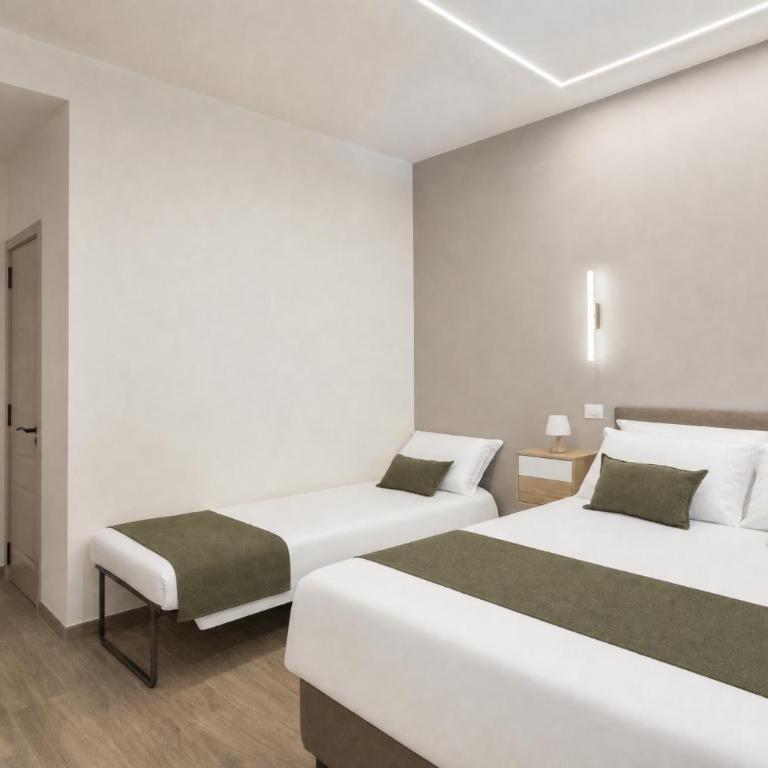 Giusi Rooms - Piazza Vittorio Guesthouse - Habitación Triple Confort con ducha - 3
