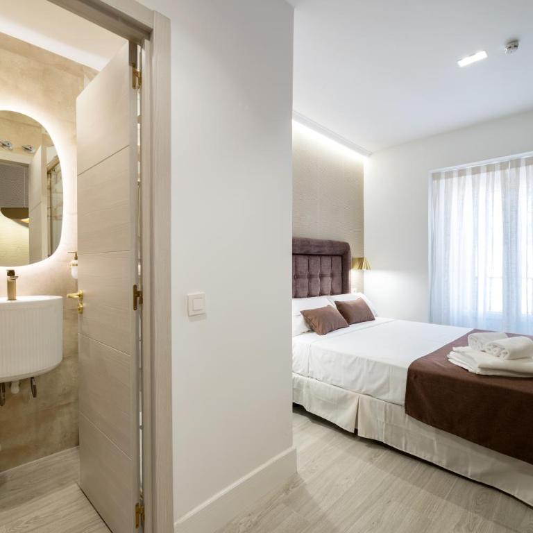 Rosales Suites - Camera Deluxe Matrimoniale/Doppia con Letti Singoli con Vista Città - 1