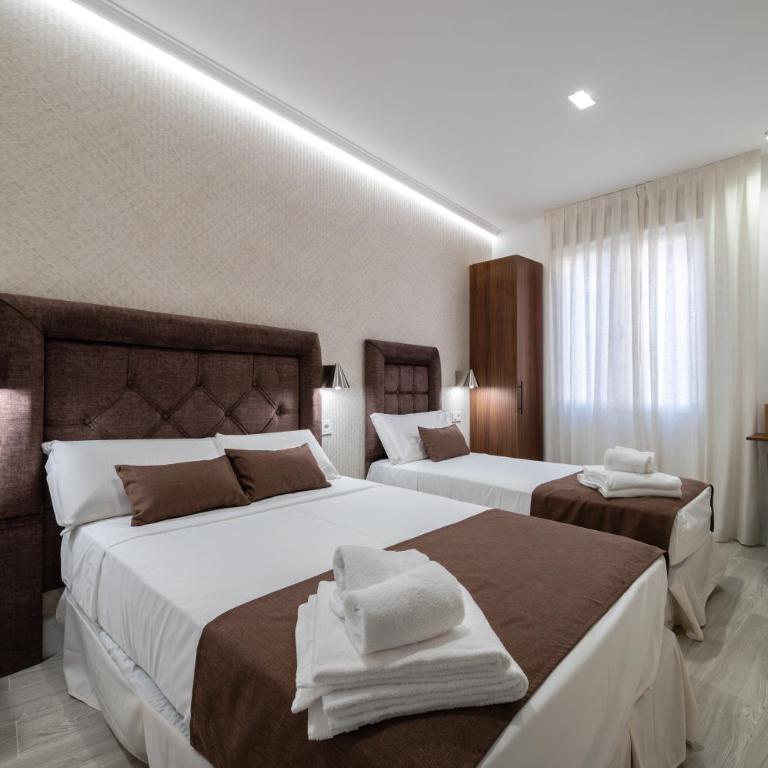 Rosales Suites - Camera Tripla Deluxe - 3