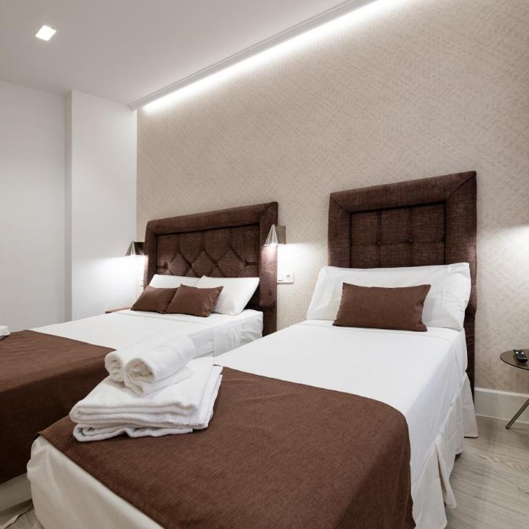Rosales Suites - Camera Tripla Deluxe - 4