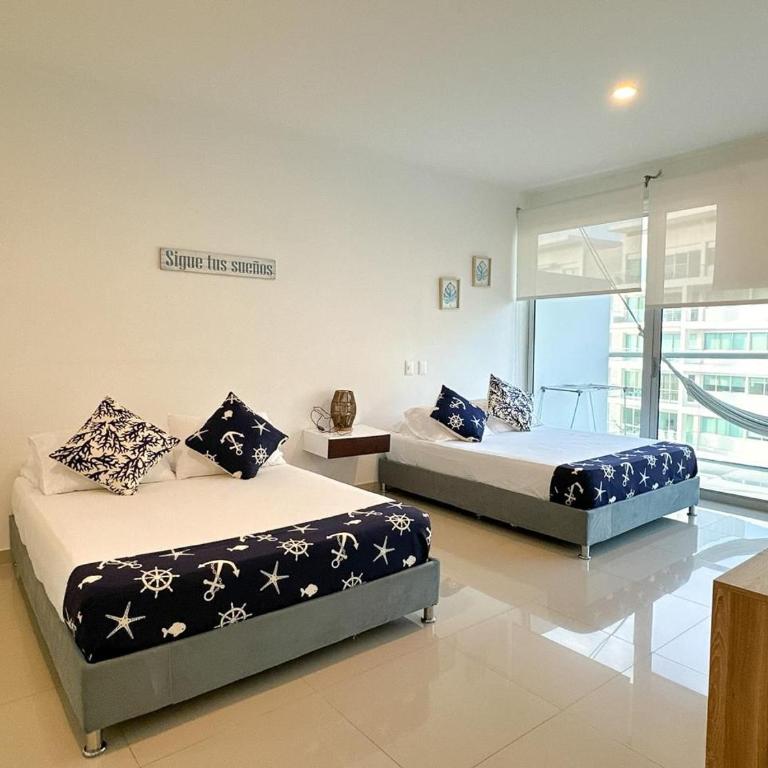 Bello apartamento con salida directa a la playa - Two-Bedroom Apartment - 15