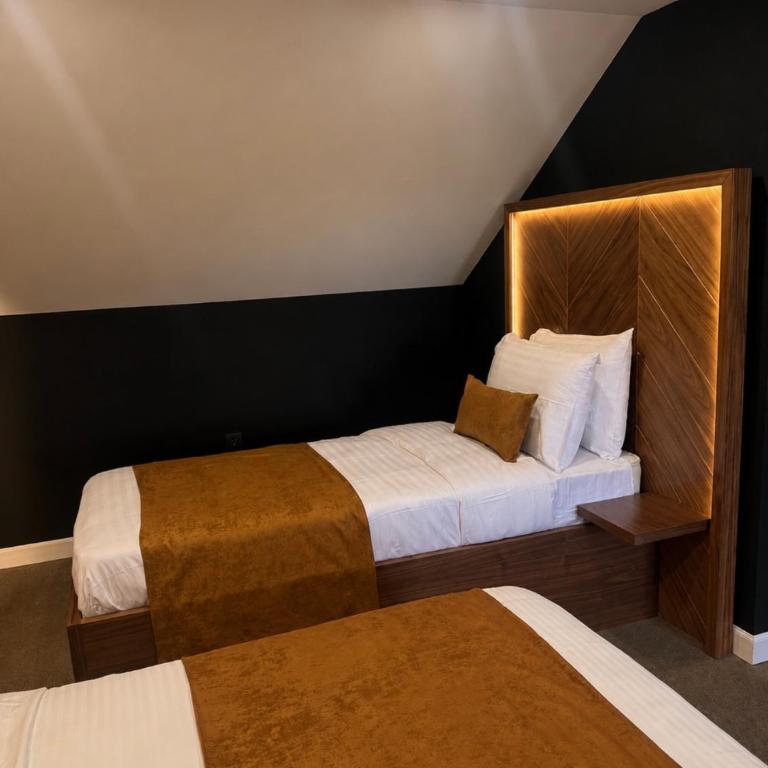 Hotel Falcon - Deluks Porodična Soba - 11