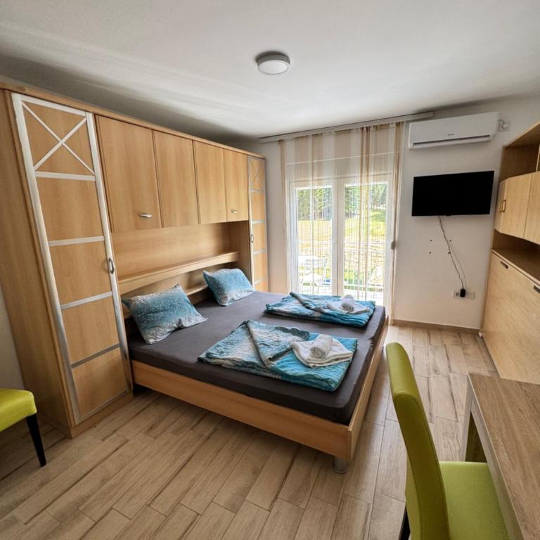 Apartmani Janošević - Dvokrevetna Soba sa Bračnim Krevetom - 1