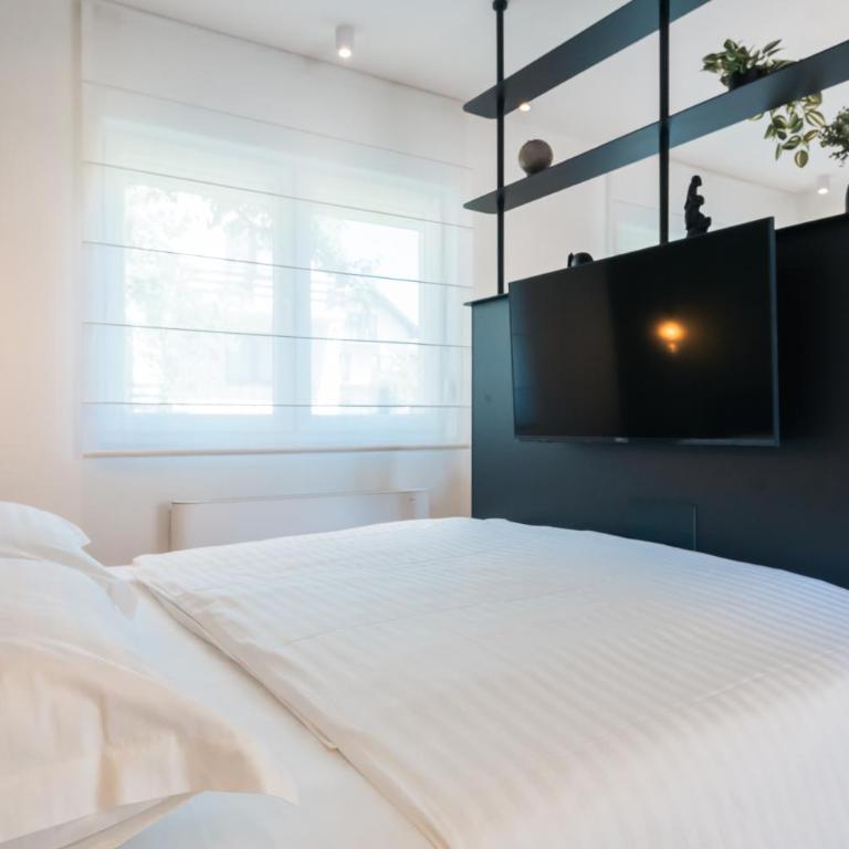 L A Apartments ILIDŽA by Ben&Co - Luksuzna Četvorokrevetna Soba - 15
