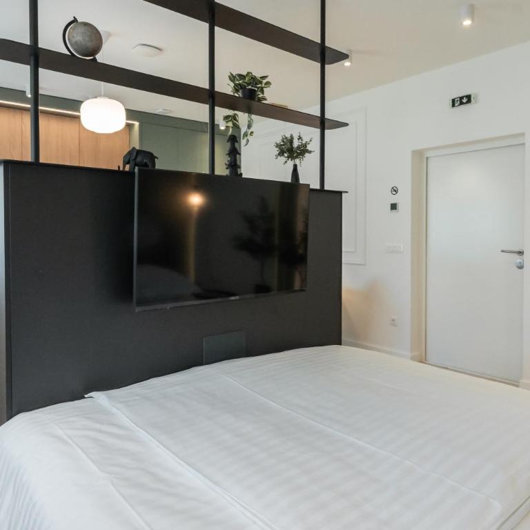 L A Apartments ILIDŽA by Ben&Co - Luksuzna Četvorokrevetna Soba - 14