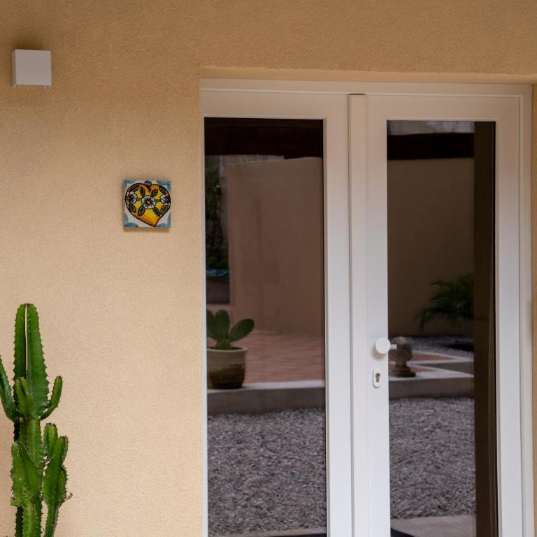 Mura garden & suites Tancredi-Rosalia - Deluxe Apartment mit 1 Schlafzimmer und Gartenblick - 12