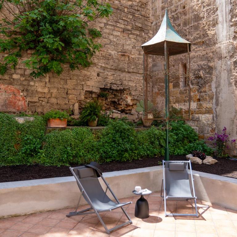 Mura garden & suites Tancredi-Rosalia - Deluxe Apartment mit 1 Schlafzimmer und Gartenblick - 17