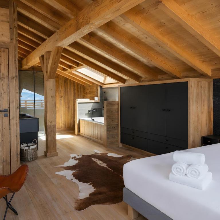 Splendide châlet neuf avec jaccuzzi - Three-Bedroom Chalet - 15
