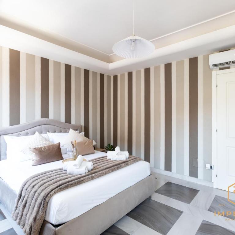 Imperium Testaccio Retreat - up to 7 pax, 2 balconies, 15 min to trastevere and metro station - Apartamento Deluxe de 2 dormitorios con balcón - 6