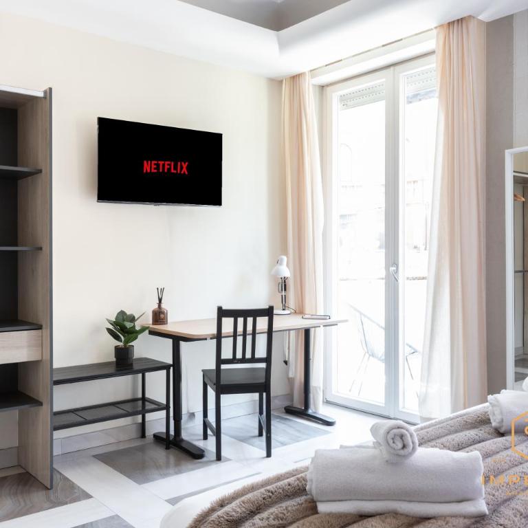 Imperium Testaccio Retreat - up to 7 pax, 2 balconies, 15 min to trastevere and metro station - Apartamento Deluxe de 2 dormitorios con balcón - 10