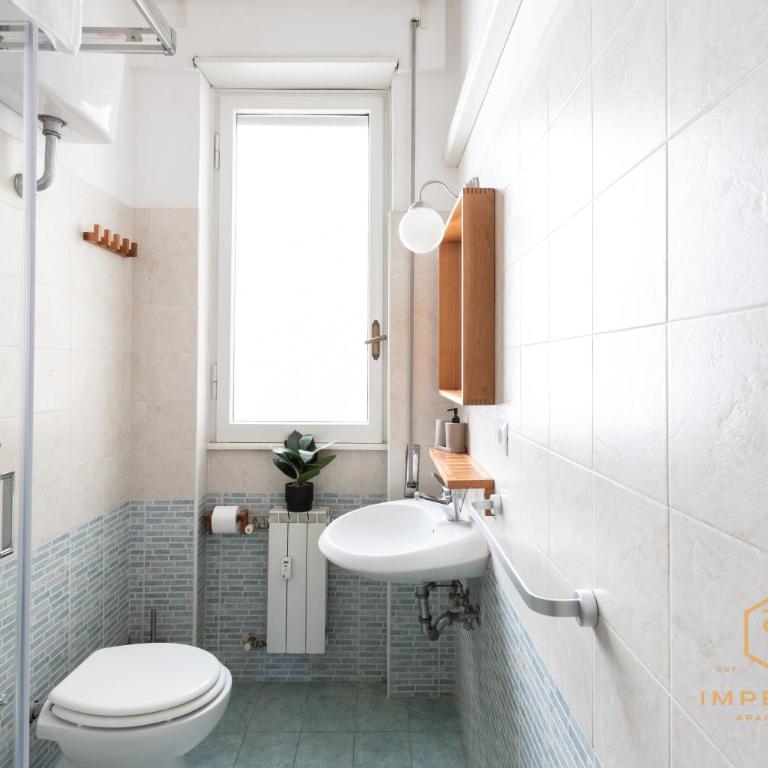 Imperium Testaccio Retreat - up to 7 pax, 2 balconies, 15 min to trastevere and metro station - Apartamento Deluxe de 2 dormitorios con balcón - 45