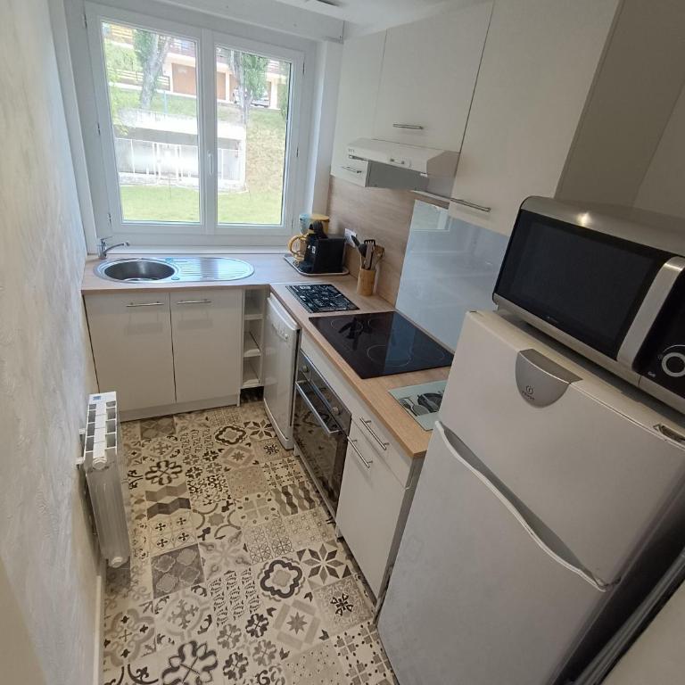 Appartement cozy et lumineux avec terrasse - Appartement 1 Chambre avec Balcon et Vue sur les Montagnes - 7