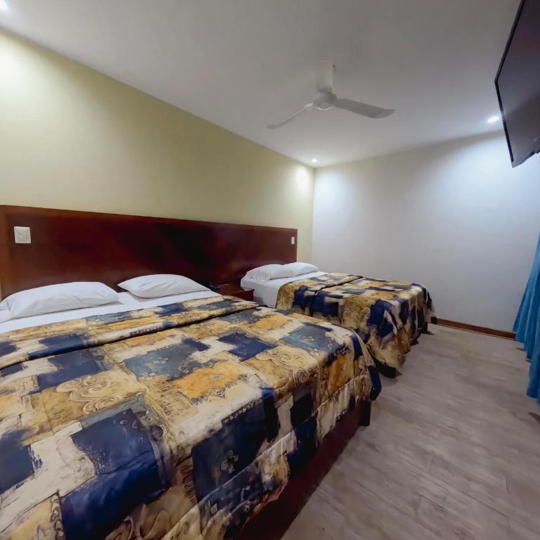 Hotel Esencia Suites - Habitación Doble Deluxe - 2 camas - 6
