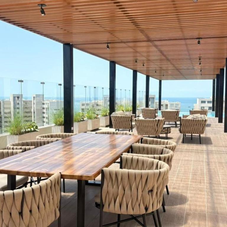 Infinity pool beach view - One-Bedroom Apartment - 3