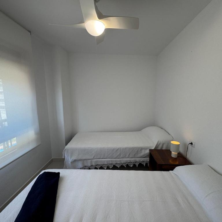 Beachfront apartment with a pool - Three-Bedroom Apartment with Sea View - 25