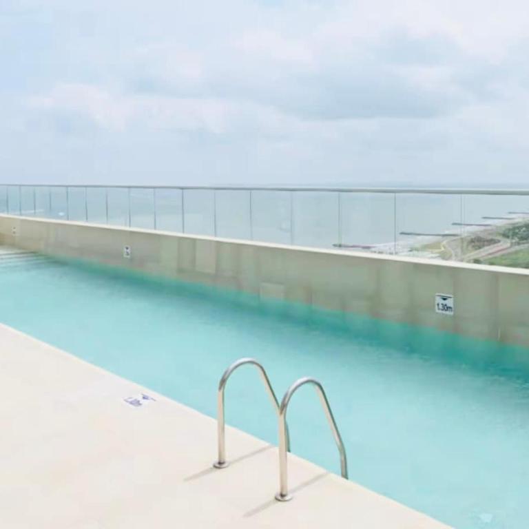 Ivory Tide, Sea View, Pool & Coastal Calm - Three-Bedroom Apartment with Sea View - 35