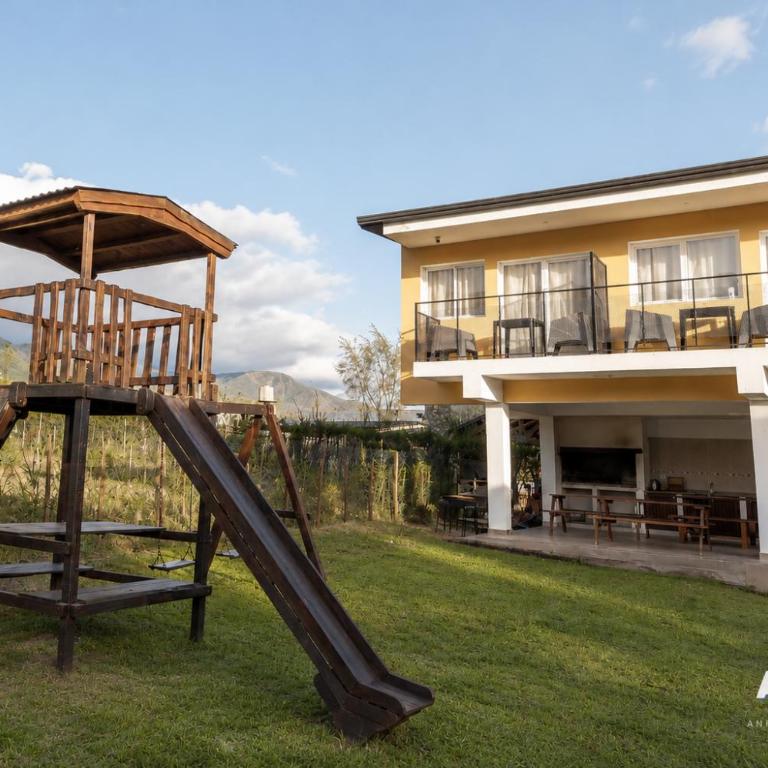 Suites Amplias y Comfortables - Con Balcon, Parquizado, Asador y Pileta - Suite con vistas a la montaña - 5