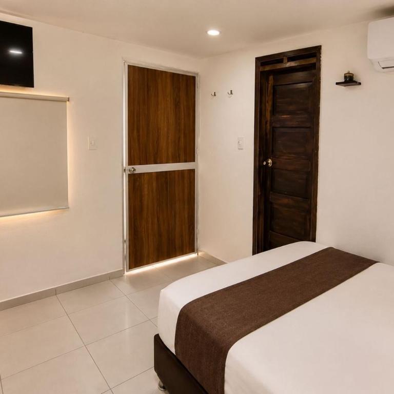 Ayenda Hotel Helenas - Habitación Triple Estándar - 6