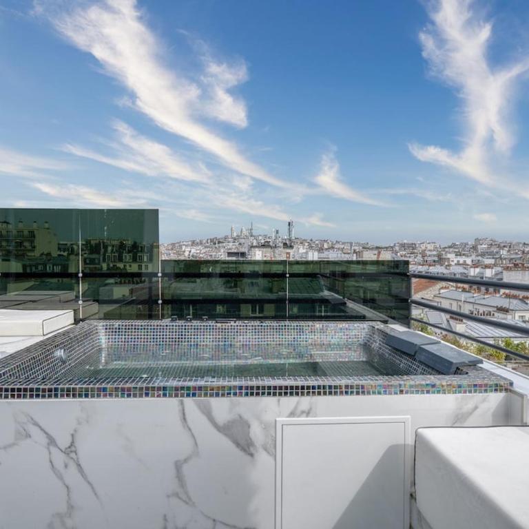 Penthouse with Jacuzzi Top floor Paris 17th arrondissement - Apartment mit 1 Schlafzimmer - 52