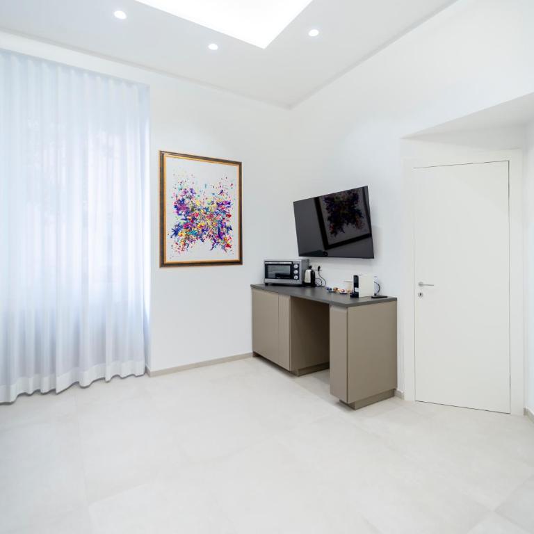 Epicuro Luxury Suites - Suite Familiare Deluxe - 1