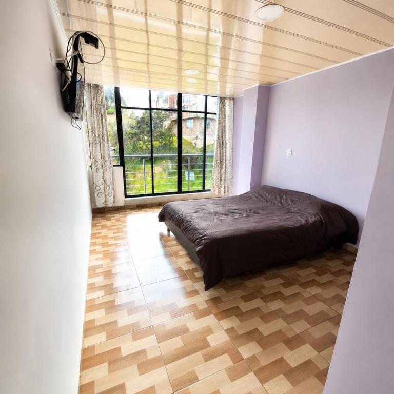 Living Robayo Paipa - Three-Bedroom Apartment - 13