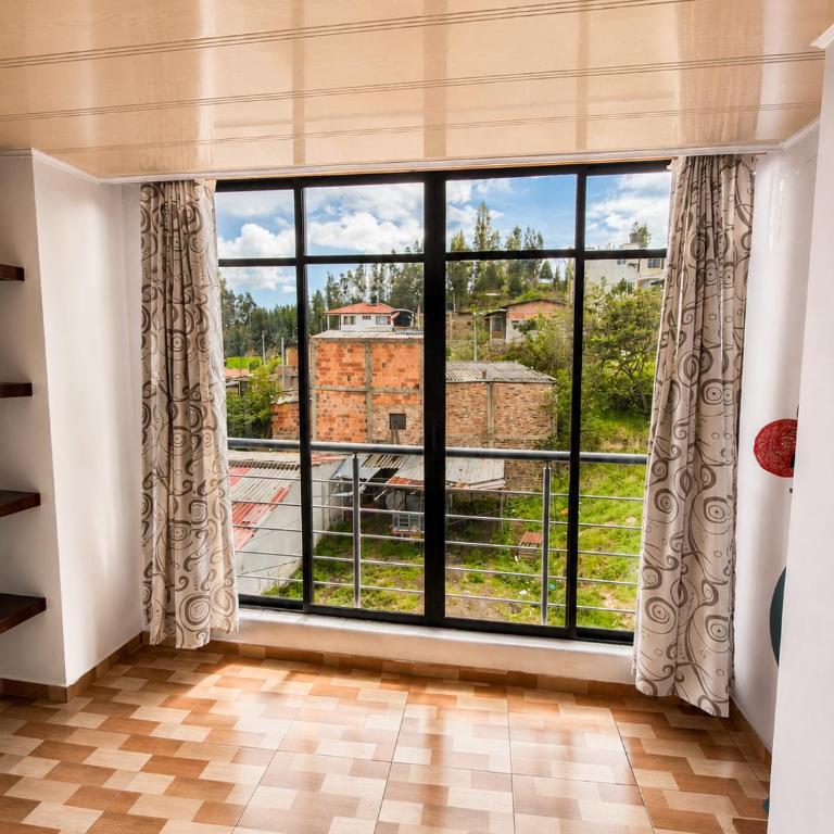 Living Robayo Paipa - Three-Bedroom Apartment - 1