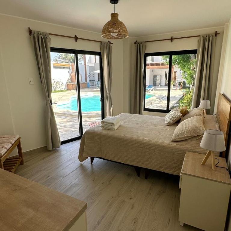 Private Room in Seafront House - Queen Room with Pool View - 37