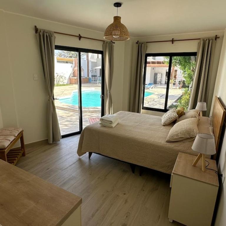 Private Room in Seafront House - Queen Room with Pool View - 38