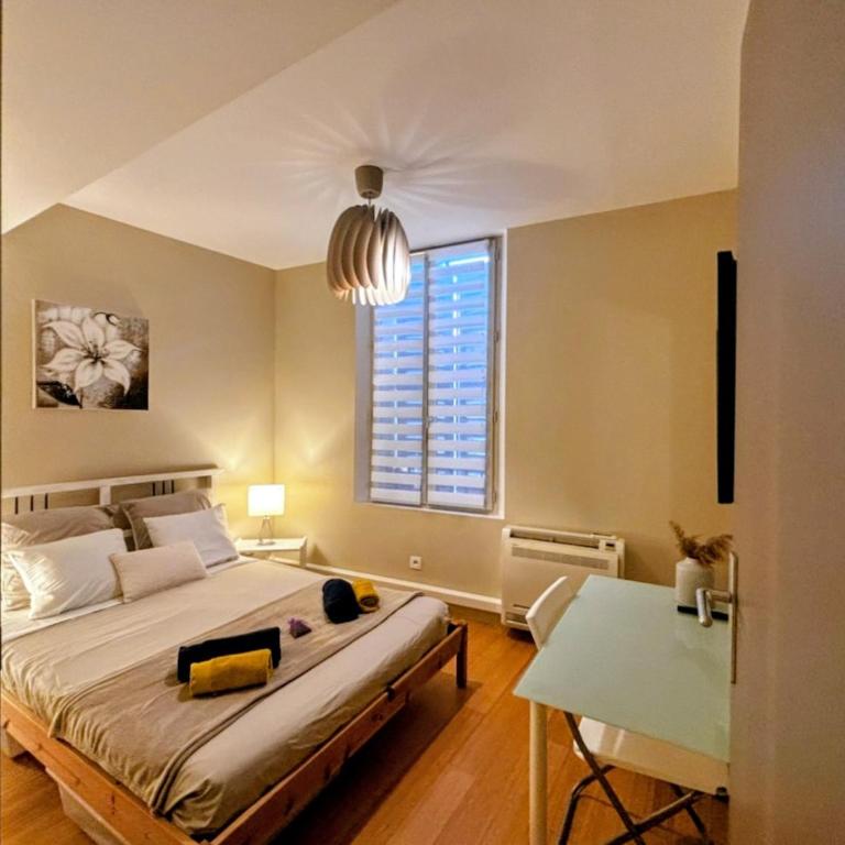 Spacieux 74 m2 Standing Clim & Parking Privé Centre Ville - Appartement 1 Chambre avec Terrasse - 46