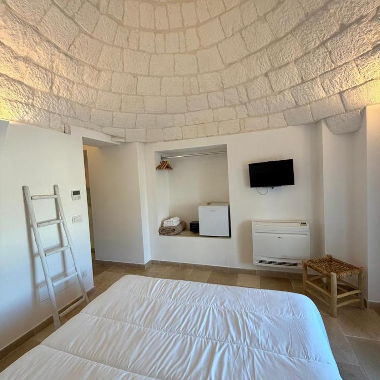 Trulli Dafani - Camera Matrimoniale con Vista Parco - 10