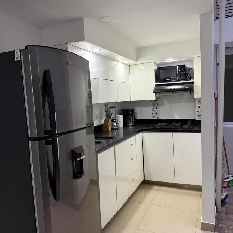 Apartamento en el poblado , manila 4 - Three-Bedroom Apartment - 5