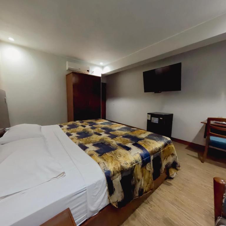 Hotel Esencia Suites - Habitación Deluxe con cama extragrande - 5