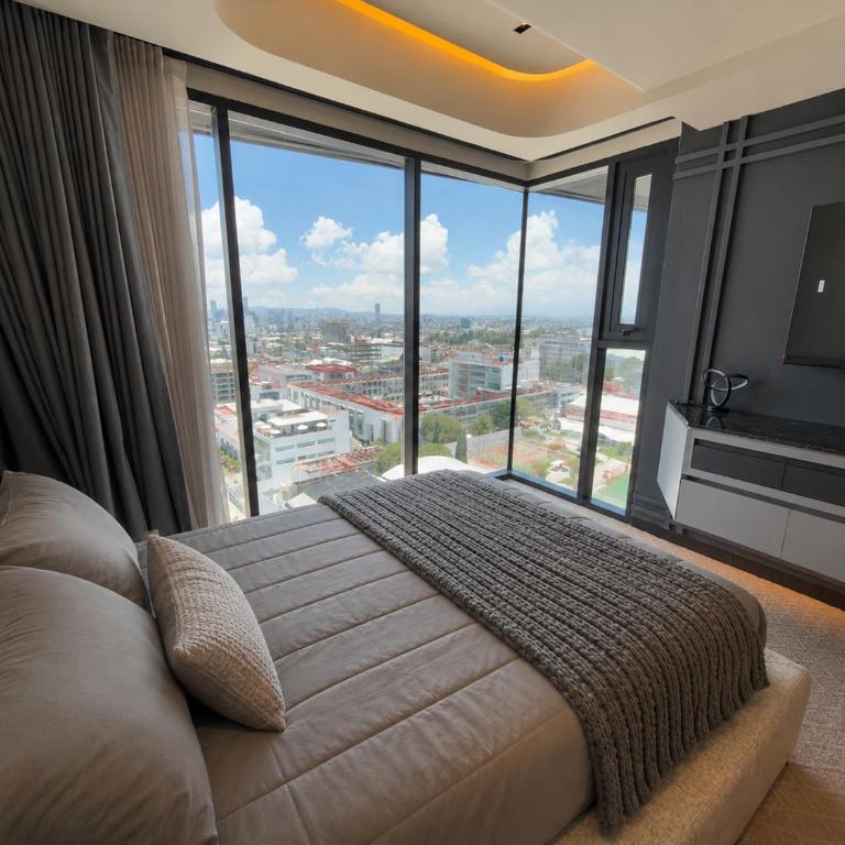 Loft SM Living Juárez UPAEP - Apartamento Deluxe de 1 dormitorio con vistas a la ciudad - 16