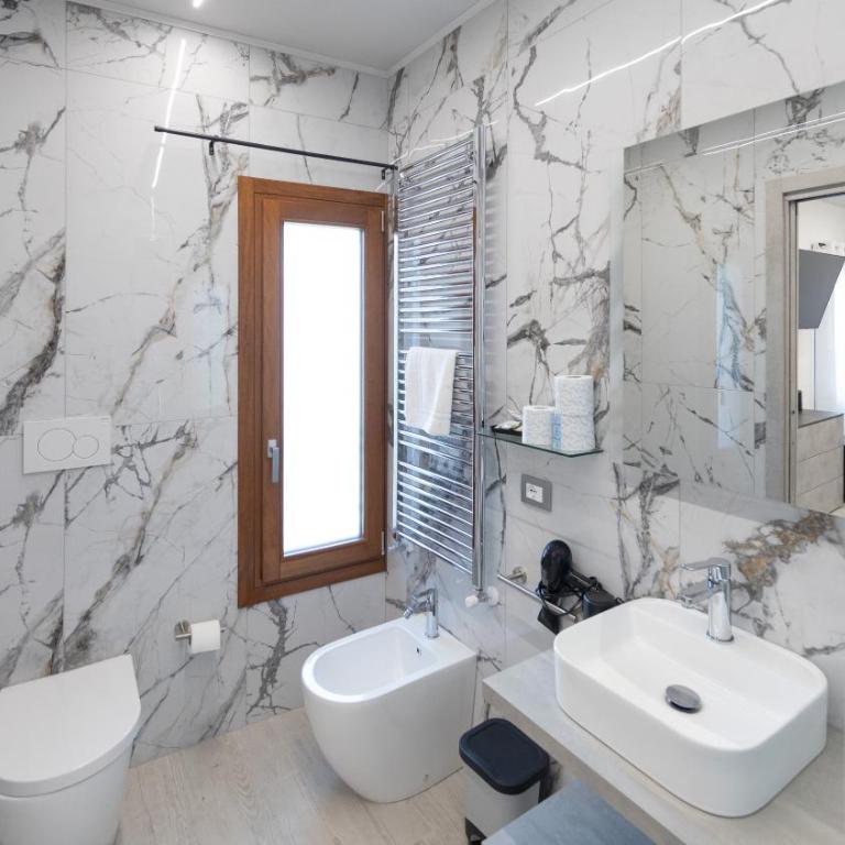 Locazione turistica AL PORTO - Camera Quadrupla con Bagno - 1