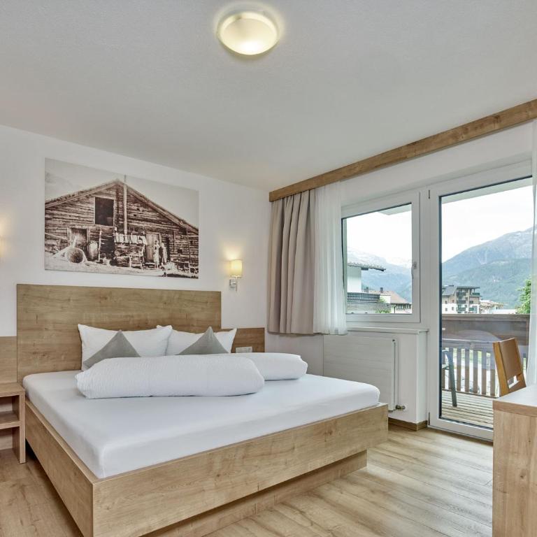 Appartement Gästehaus Bergkristall - Apartment mit 2 Schlafzimmern und Balkon - 4