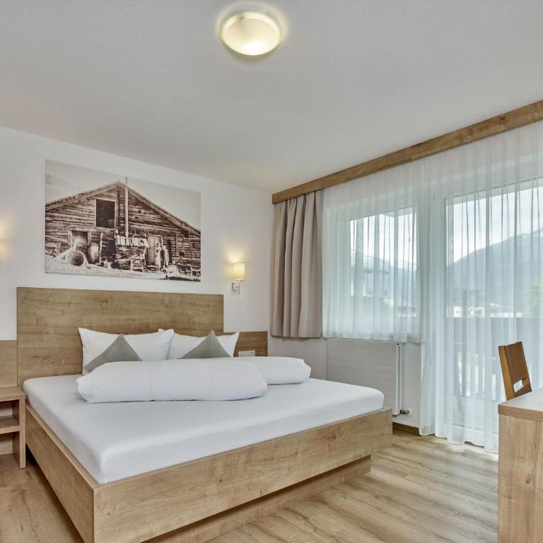 Appartement Gästehaus Bergkristall - Apartment mit 2 Schlafzimmern und Balkon - 6