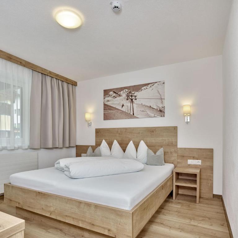 Appartement Gästehaus Bergkristall - Apartment mit 2 Schlafzimmern und Balkon - 13