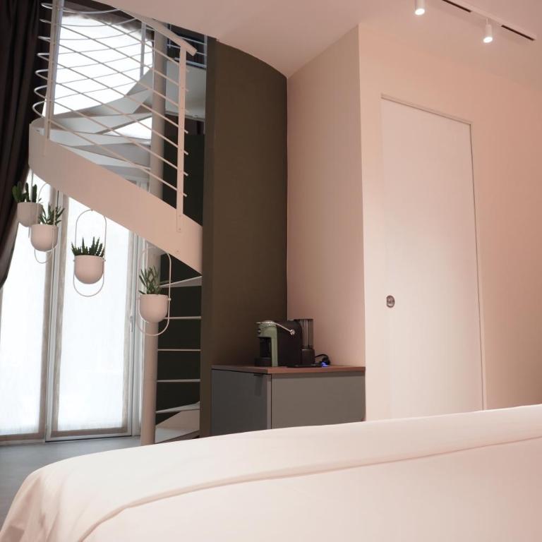 Corsocentodue Suites - Camera Quadrupla - 6