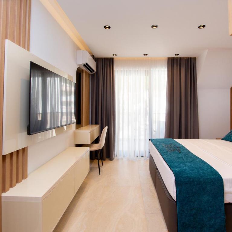 Premium Apartments Zevs - Deluks Dvokrevetna Soba sa Bračnim Krevetom i Balkonom - 16