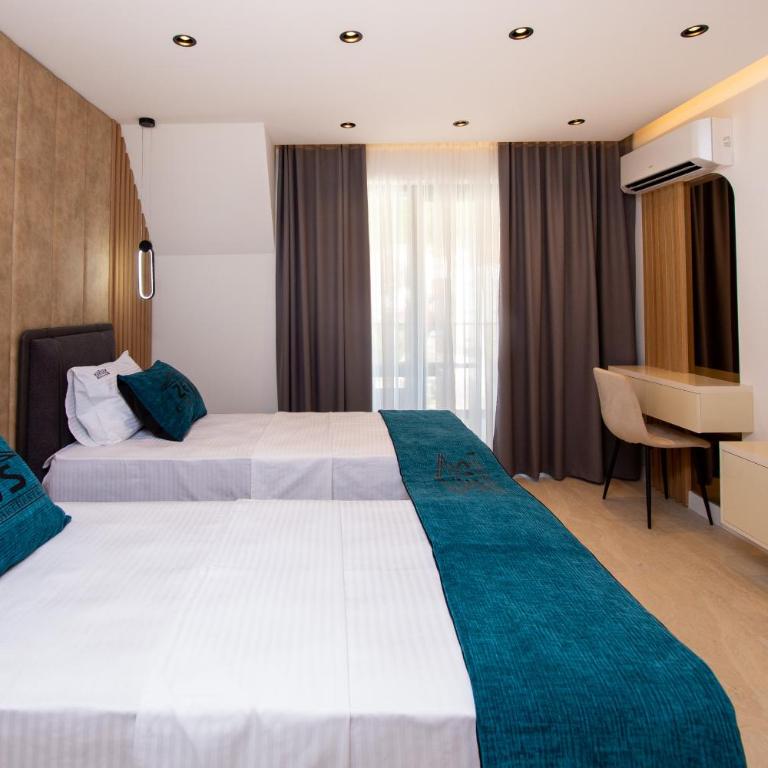 Premium Apartments Zevs - Deluks Dvokrevetna Soba sa Bračnim Krevetom/Zasebnim Krevetima i Balkonom - 6