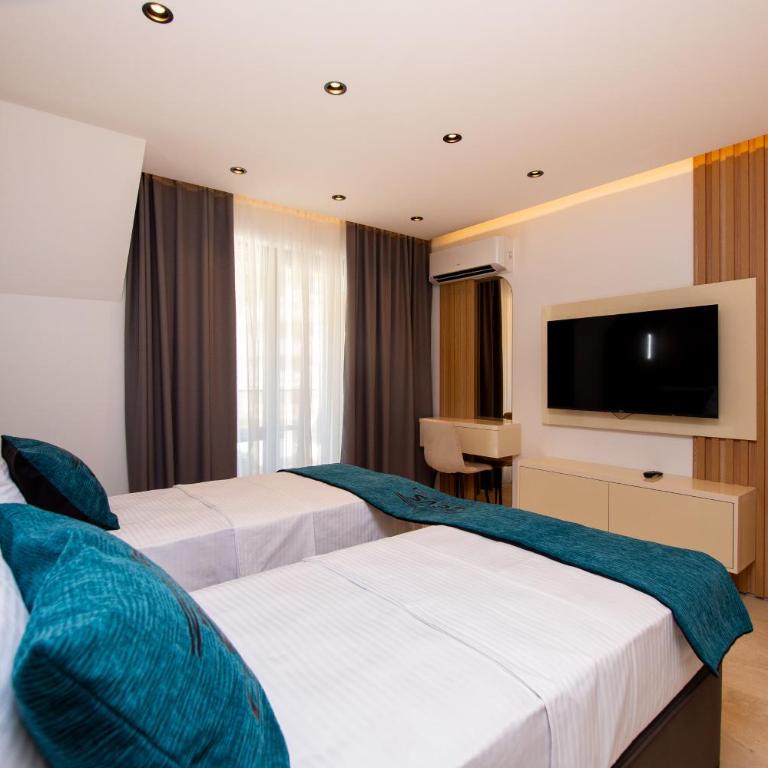 Premium Apartments Zevs - Deluks Dvokrevetna Soba sa Bračnim Krevetom/Zasebnim Krevetima i Balkonom - 11