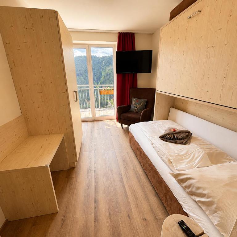Jaga Alm - Apartment mit 3 Schlafzimmern und Seeblick - 8