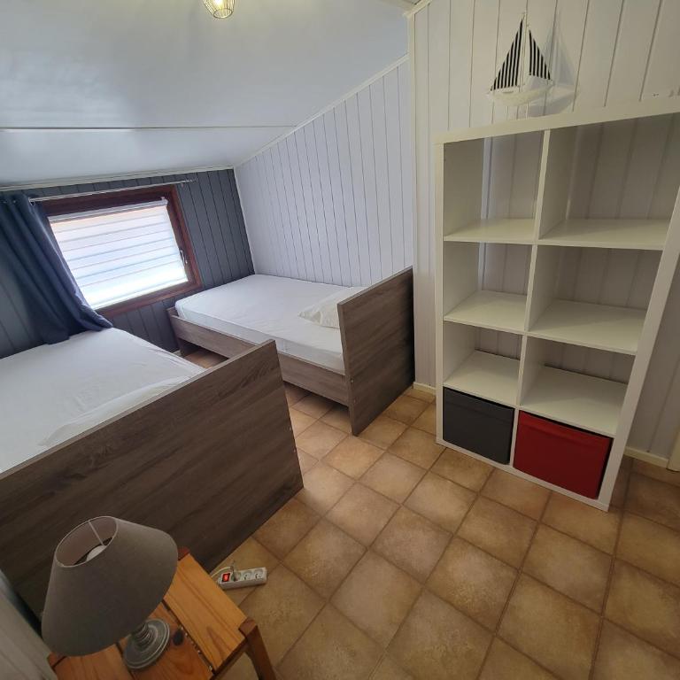 Belle villa de vacances climatisée, residence TAMARIS, wifi, 2 chambres 4 à 6 couchages, accès payant pour les piscines et animations , PORTIRAGNES PLAGE LRTAMA57 - Maison 2 Chambres - 12
