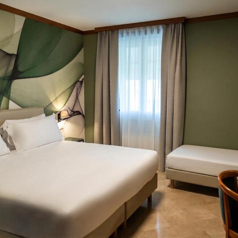 Spazio Origine - Studio Hotel - Camera Tripla - 1