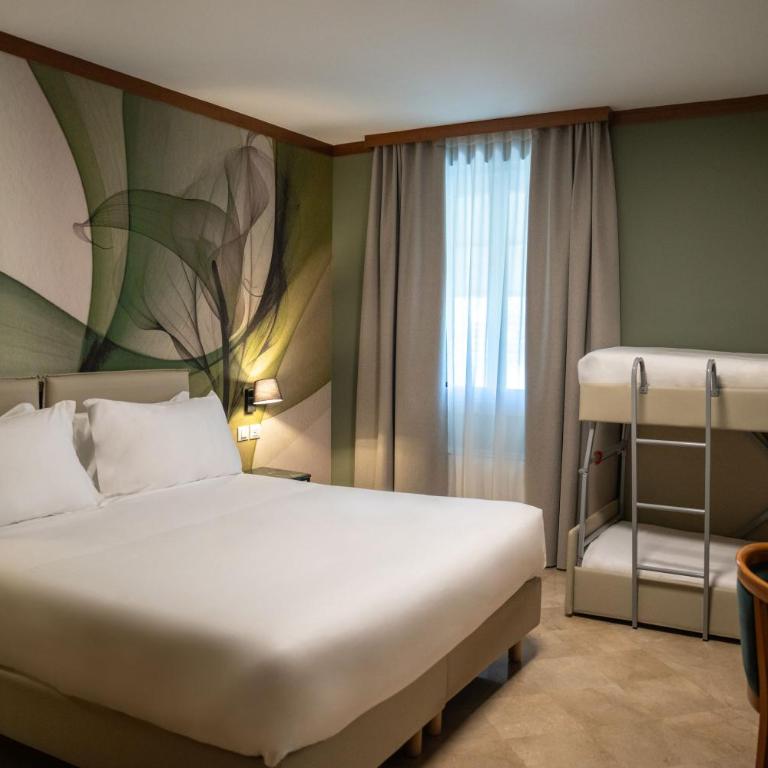 Spazio Origine - Studio Hotel - Camera Quadrupla - 1