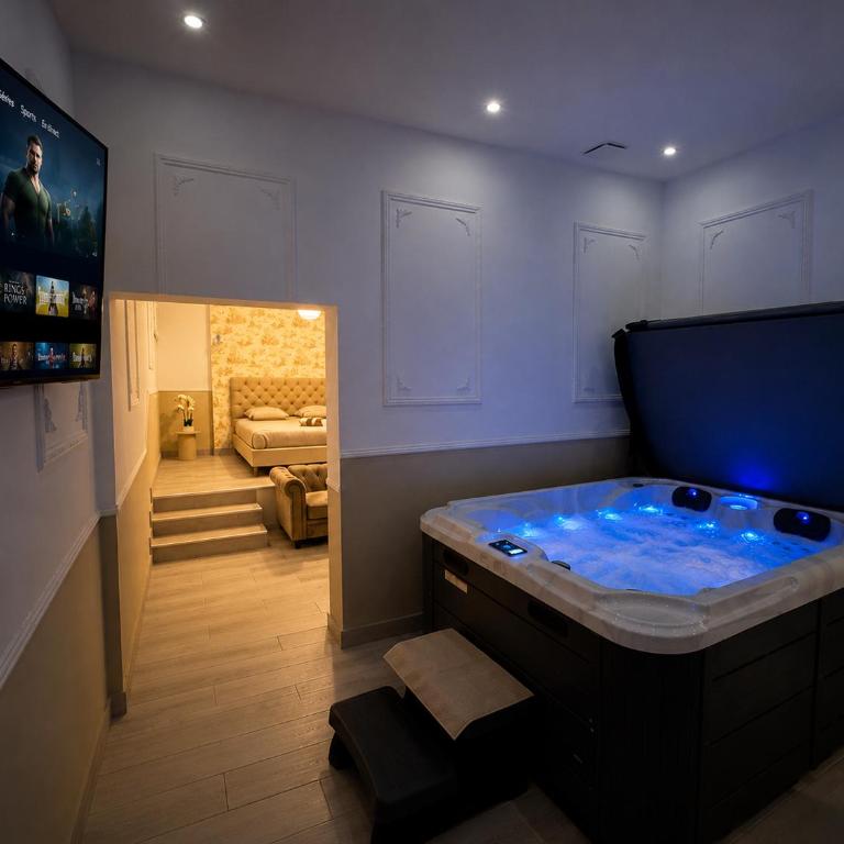 Eaux Spa Suites - Zimmer mit Queensize-Bett und Whirlpool-Badewanne - 8